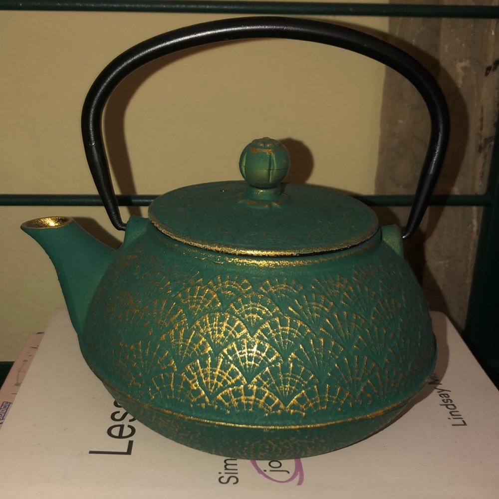 Green and gold tea kettle